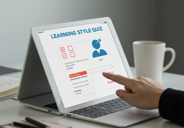 User taking an online learning style quiz on a tablet.